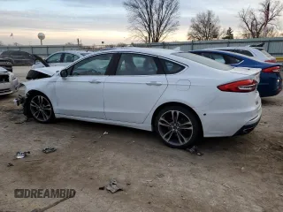 2019 Ford Fusion Titanium with VIN 3FA6P0D91KR263556, listed as a Copart auction lot 85587244 with 73,758 mi miles and Salvage Title. Bid and sale history available at carsss.com. Image 2.