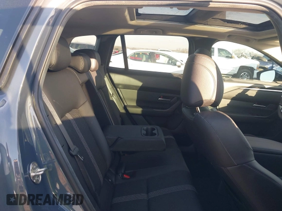 2024 Mazda CX-50 S Premium with VIN 7MMVABDM1RN201756, listed as a IAAI auction lot 41282874 with 2,019 mi miles and . Bid and sale history available at DreamBid. Image 8.