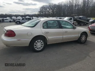 2001 Lincoln Continental with VIN 1LNHM97V71Y711352, listed as a Copart auction lot 46235305 with 122,786 mi miles and Salvage Title. Bid and sale history available at DreamBid. Image 3.