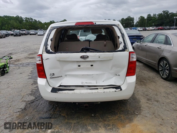 2006 Kia Sedona LX with VIN KNDMB233466022537, listed as a Copart auction lot 71130354 with 215,997 mi miles and Salvage Title. Bid and sale history available at carsss.com. Image 6.