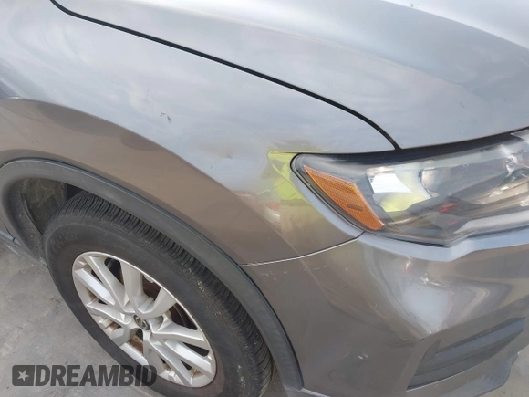 2017 Nissan Rogue SV with VIN KNMAT2MV1HP583081, listed as a IAAI auction lot 42156332 with 105,723 mi miles. Bid and sale history available at carsss.com. Image 6.
