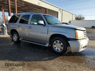 2004 Cadillac Escalade with VIN 1GYEC63T94R208993, listed as a Copart auction lot 87224664 with 285,642 mi miles and Salvage title. Bid and sale history available at DreamBid. Image 4.