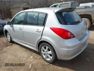 2012 Nissan Versa S with VIN 3N1BC1CP2CK272290, listed as a IAAI auction lot 42030626 with 136,000 mi miles. Bid and sale history available at carsss.com. Image 3.