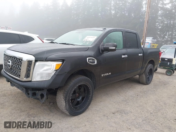 2017 Nissan Titan SV with VIN 1N6AA1EJ9HN539866, listed as a IAAI auction lot 41875425 with 78,159 mi miles and . Bid and sale history available at DreamBid. Image 2.