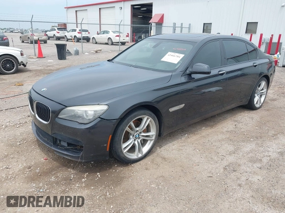 2011 BMW 7 Series 740Li with VIN WBAKB4C58BC574815, listed as a IAAI auction lot 42466704 with 155,292 mi miles and . Bid and sale history available at DreamBid. Image 2.