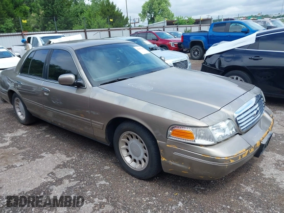 2002 Ford Crown Victoria LX z VIN 2FAFP74W52X112493, wystawiony jako IAAI lot #42197164 z przebiegiem 103 941 mil mil oraz . Historia ofert i sprzedaży dostępna na DreamBid. Obrazek 1.