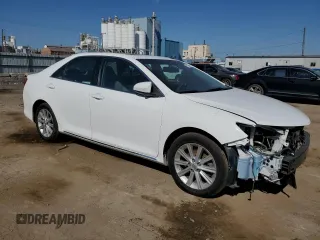 2014 Toyota Camry SE with VIN 4T1BK1FK9EU552089, listed as a Copart auction lot 72788494 with 144,198 mi miles and Salvage Title. Bid and sale history available at carsss.com. Image 4.