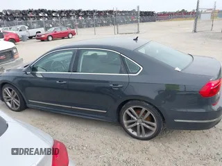 2016 Volkswagen Passat S with VIN 1VWAT7A37GC042880, listed as a IAAI auction lot 42092850 with 215,267 mi miles and . Bid and sale history available at DreamBid. Image 14.