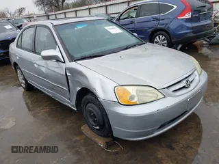 2003 Honda Civic z VIN 2HGES25843H594152, wystawiony jako IAAI lot #41539562 z przebiegiem 253 427 mil mil oraz . Historia ofert i sprzedaży dostępna na DreamBid. Obrazek 1.