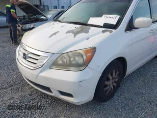 2010 Honda Odyssey EX with VIN 5FNRL3H41AB008005, listed as a IAAI auction lot 42058519 with 214,175 mi miles. Bid and sale history available at carsss.com. Image 15.