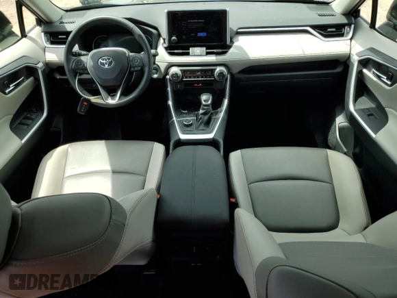 2023 Toyota RAV4 Hybrid XLE Premium z VIN JTMB6RFV1PD100836, wystawiony jako Copart lot #51694985 z przebiegiem 19 870 mil mil oraz Szkoda całkowita • Salvage title. Historia ofert i sprzedaży dostępna na DreamBid. Obrazek 8.