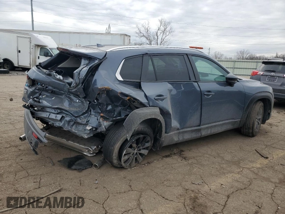 2025 Mazda CX-50 S Premium z VIN 7MMVABDM9SN322170, wystawiony jako Copart lot #85856354 z przebiegiem 1 774 mil mil oraz Czysty tytuł • Clean title. Historia ofert i sprzedaży dostępna na DreamBid. Obrazek 3.