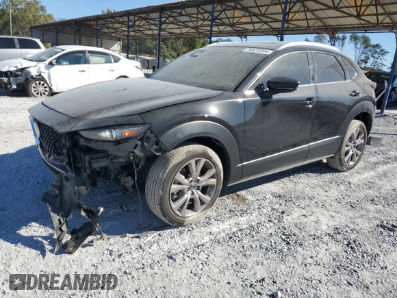 2020 Mazda CX-30 Premium with VIN 3MVDMAEM4LM137806, listed as a Copart auction lot 76620304 with 65,071 mi miles and Salvage title. Bid and sale history available at DreamBid. Image 1.