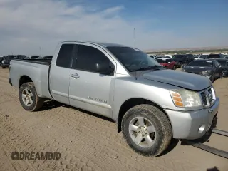 2006 Nissan Titan XE with VIN 1N6AA06B96N543317, listed as a Copart auction lot 55826275 with 236,264 mi miles and Salvage title. Bid and sale history available at DreamBid. Image 4.