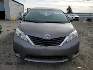 2014 Toyota Sienna LE with VIN 5TDJK3DC7ES073648, listed as a Copart auction lot 50554095 with 136,236 mi miles and Salvage Title. Bid and sale history available at DreamBid. Image 5.