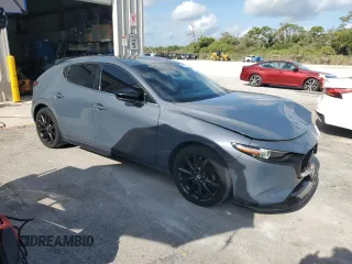 2021 Mazda 3 Premium Plus with VIN JM1BPBNYXM1403126, listed as a Copart auction lot 59971535 with 56,952 mi miles and Salvage title. Bid and sale history available at DreamBid. Image 4.