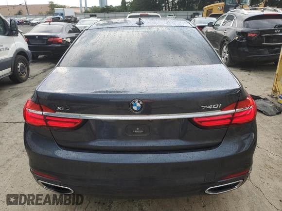2017 BMW 7 Series 740i xDrive with VIN WBA7E4C32HGU99963, listed as a Copart auction lot 65848354 with 99,396 mi miles and Salvage Title. Bid and sale history available at carsss.com. Image 6.