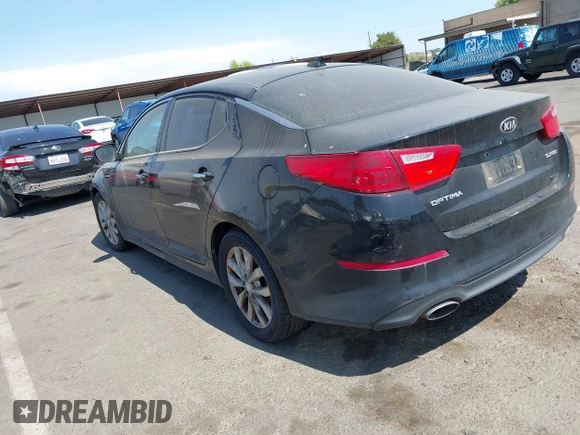 2015 Kia Optima EX z VIN 5XXGN4A75FG420329, wystawiony jako IAAI lot #42574401 z przebiegiem 223 816 mil mil oraz . Historia ofert i sprzedaży dostępna na DreamBid. Obrazek 3.