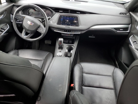 2019 Cadillac XT4 FWD Premium Luxury z VIN 1GYFZCR49KF147242, wystawiony jako Copart lot #55483215 z przebiegiem 94 990 mil mil oraz Szkoda całkowita • Salvage title. Historia ofert i sprzedaży dostępna na DreamBid. Obrazek 8.