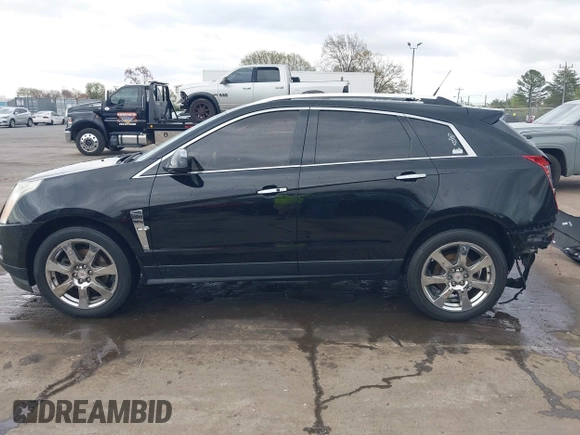 2012 Cadillac SRX Performance Collection with VIN 3GYFNBE39CS556339, listed as a IAAI auction lot 41838058 with 182,244 mi miles and . Bid and sale history available at DreamBid. Image 15.