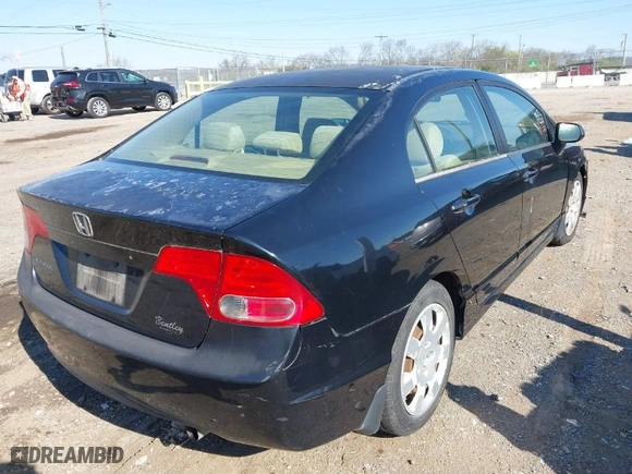 2006 Honda Civic Sdn LX with VIN 1HGFA16586L139771, listed as a IAAI auction lot 41894847 with 230,878 mi miles. Bid and sale history available at carsss.com. Image 4.
