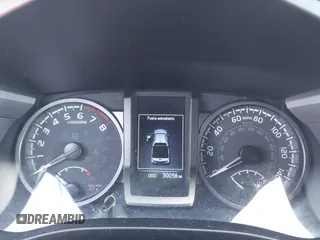 2023 Toyota Tacoma SR z VIN 3TYCZ5AN5PT151681, wystawiony jako IAAI lot #41936577 z przebiegiem 30 056 mil mil oraz . Historia ofert i sprzedaży dostępna na DreamBid. Obrazek 7.