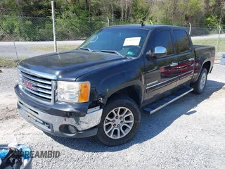 2010 GMC Sierra 1500 SLT with VIN 3GTRCWE09AG122055, listed as a IAAI auction lot 42064233 with 266,560 mi miles and . Bid and sale history available at DreamBid. Image 2.