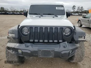 2023 Jeep Wrangler Sport S with VIN 1C4HJXDN3PW522353, listed as a Copart auction lot 86645234 with 17,562 mi miles and Salvage Title. Bid and sale history available at DreamBid. Image 5.