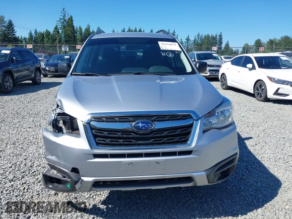 2018 Subaru Forester with VIN JF2SJABC1JH460789, listed as a IAAI auction lot 42631854 with 86,215 mi miles and . Bid and sale history available at DreamBid. Image 13.