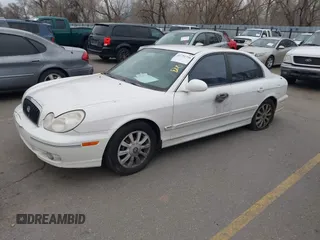 2003 Hyundai Sonata GLS with VIN KMHWF35H93A889013, listed as a IAAI auction lot 41751356 with 213,896 mi miles. Bid and sale history available at carsss.com. Image 2.