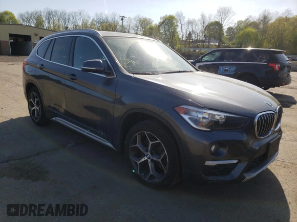 2018 BMW X1 xDrive28i with VIN WBXHT3C33J5K31838, listed as a Copart auction lot 48650943 with 63,064 mi miles and . Bid and sale history available at DreamBid. Image 4.