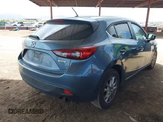 2014 Mazda 3 i Touring with VIN JM1BM1L71E1151538, listed as a IAAI auction lot 42148640 with 136,564 mi miles and . Bid and sale history available at DreamBid. Image 4.