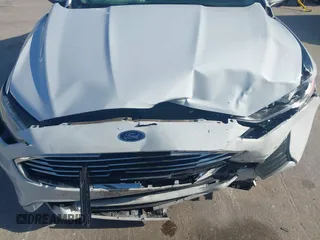 2019 Ford Fusion SE with VIN 3FA6P0HD1KR217840, listed as a IAAI auction lot 42011309 with 85,945 mi miles and . Bid and sale history available at carsss.com. Image 12.