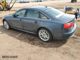 2014 Audi A6 3.0L TDI Prestige with VIN WAUHMAFC1EN063193, listed as a Copart auction lot 51286155 with 121,015 mi miles and Salvage Title. Bid and sale history available at carsss.com. Image 2.