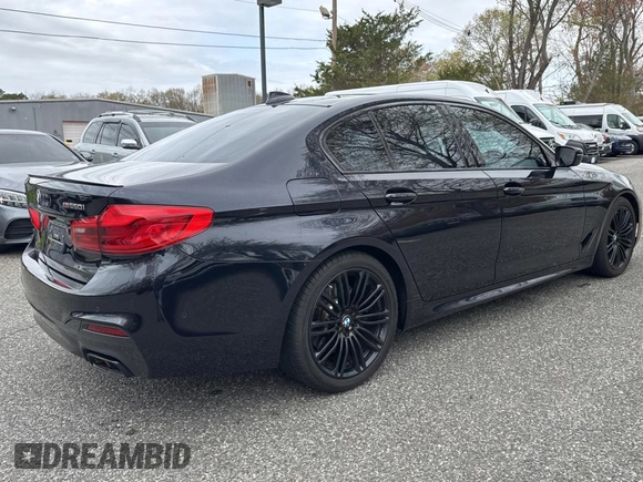 2018 BMW 5 Series M550i xDrive with VIN WBAJB9C57JB035521, listed as a Copart auction lot 54177125 with 63,924 mi miles and Clean Title. Bid and sale history available at carsss.com. Image 4.