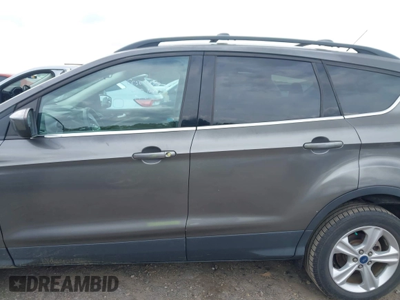 2013 Ford Escape SE with VIN 1FMCU9GX4DUC98328, listed as a IAAI auction lot 41956249 with 114,195 mi miles and . Bid and sale history available at DreamBid. Image 13.