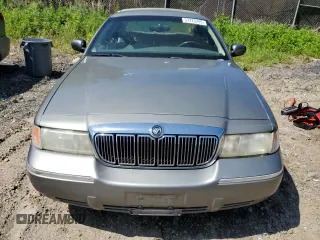2000 Mercury Grand Marquis LS z VIN 2MEFM75W7YX694301, wystawiony jako Copart lot #57225295 z przebiegiem 141 420 mil mil oraz Szkoda całkowita • Salvage title. Historia ofert i sprzedaży dostępna na DreamBid. Obrazek 5.