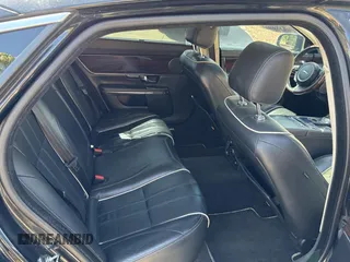 2012 Jaguar XJ with VIN SAJWA2GBXCLV24464, listed as a Copart auction lot 52572955 with 135,087 mi miles and Clean Title. Bid and sale history available at carsss.com. Image 6.