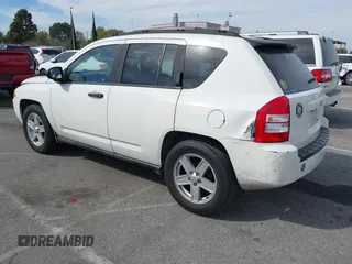 2007 Jeep Compass Sport with VIN 1J8FT47W77D145745, listed as a IAAI auction lot 41687495 with 218,231 mi miles. Bid and sale history available at carsss.com. Image 3.
