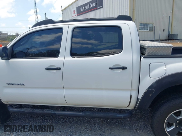 2009 Toyota Tacoma PreRunner with VIN 3TMJU62NX9M091048, listed as a IAAI auction lot 42272791 with 208,257 mi miles and . Bid and sale history available at DreamBid. Image 14.