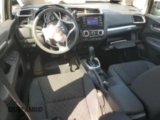 2015 Honda Fit LX с VIN 3HGGK5H59FM757797, выставлен на аукционе Copart как лот 58615175 с пробегом 109 608 миль миль и Списание • Salvage title. История ставок и продаж доступна на DreamBid. Изображение 8.