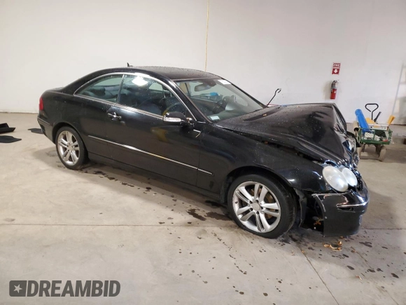 2008 Mercedes-Benz CLK-Class 3.5L with VIN WDBTJ56H08F237826, listed as a Copart auction lot 77552714 with 124,059 mi miles and Salvage Title. Bid and sale history available at carsss.com. Image 4.