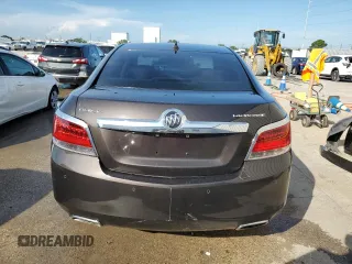 2013 Buick LaCrosse Premium 1 с VIN 1G4GF5E33DF228876, выставлен на аукционе Copart как лот 64781645 с пробегом 108 212 миль миль и Списание • Salvage title. История ставок и продаж доступна на DreamBid. Изображение 6.