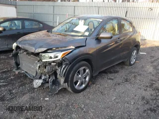 2021 Honda HR-V LX with VIN 3CZRU5H3XMM734410, listed as a IAAI auction lot 41441387 with 63,055 mi miles. Bid and sale history available at carsss.com. Image 2.