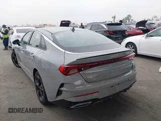 2023 Kia K5 GT-Line z VIN 5XXG64J27PG199321, wystawiony jako IAAI lot #42153677 z przebiegiem 28 798 mil mil oraz . Historia ofert i sprzedaży dostępna na DreamBid. Obrazek 3.