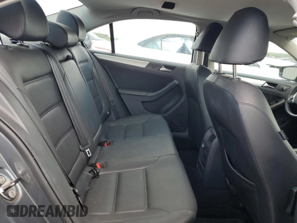 2013 Volkswagen Jetta SE z VIN 3VWDP7AJ7DM209538, wystawiony jako Copart lot #59799815 z przebiegiem 117 073 mil mil oraz Szkoda całkowita • Salvage title. Historia ofert i sprzedaży dostępna na DreamBid. Obrazek 10.
