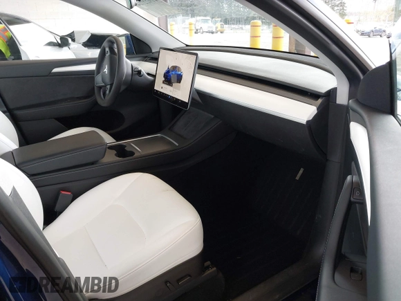 2023 Tesla Model Y Long Range with VIN 7SAYGDEEXPF621397, listed as a IAAI auction lot 41922714 with 29,460 mi miles. Bid and sale history available at carsss.com. Image 5.