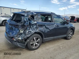 2018 Toyota RAV4 XLE with VIN JTMWFREV7JD130465, listed as a Copart auction lot 63314795 with 97,334 mi miles and Salvage title. Bid and sale history available at DreamBid. Image 3.