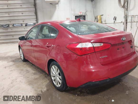 2016 Kia Forte LX with VIN KNAFX4A62G5574769, listed as a IAAI auction lot 41789886 with 127,254 mi miles. Bid and sale history available at carsss.com. Image 3.
