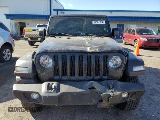 2023 Jeep Wrangler Sport with VIN 1C4HJXDN9PW512460, listed as a Copart auction lot 77107894 with 23,142 mi miles and Salvage Title. Bid and sale history available at DreamBid. Image 5.